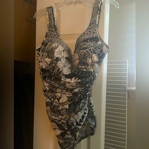 Miraclesuit bathing suit. NWOT. Never worn. Size 16